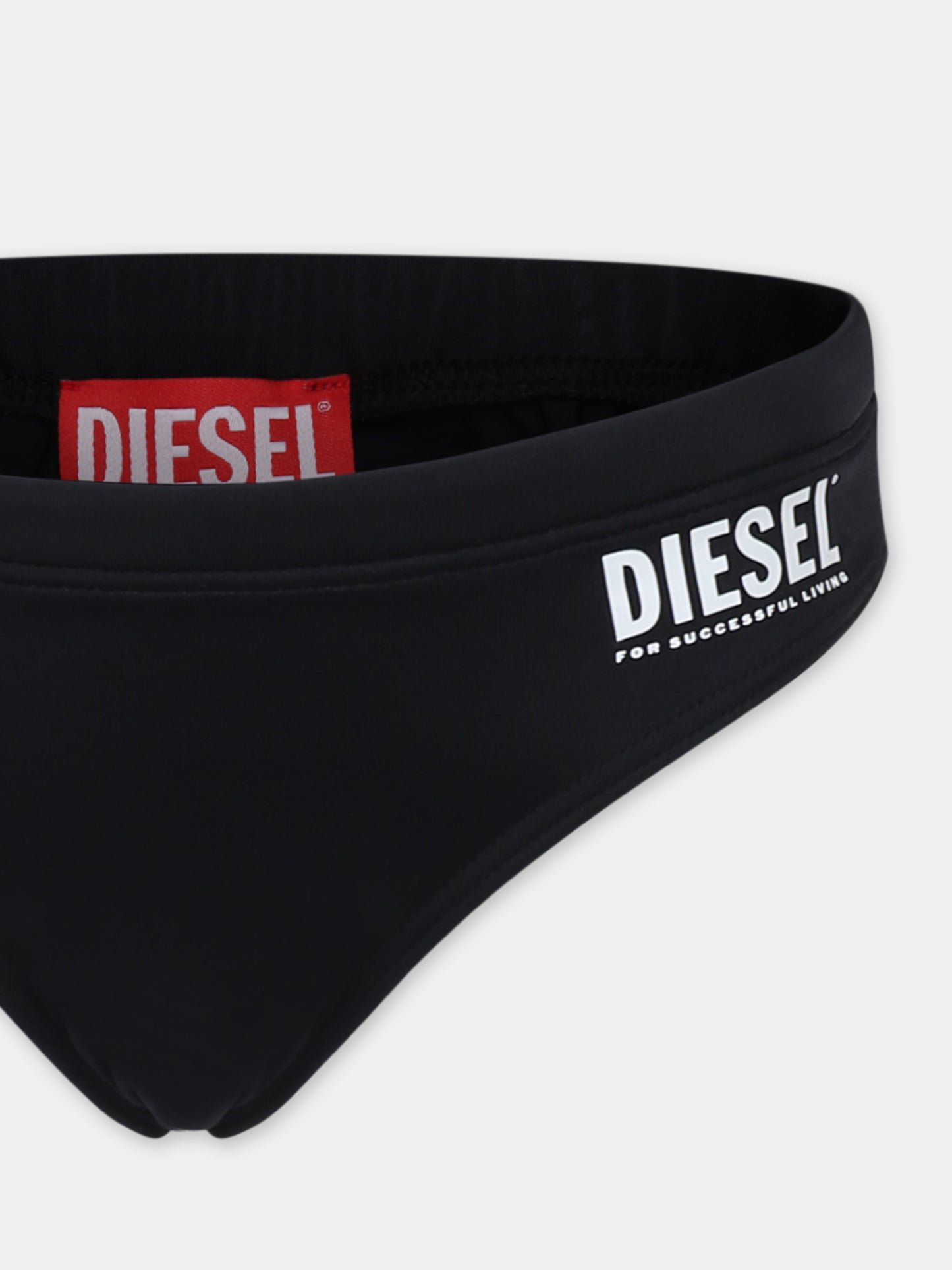 Black swim briefs for boy with logo