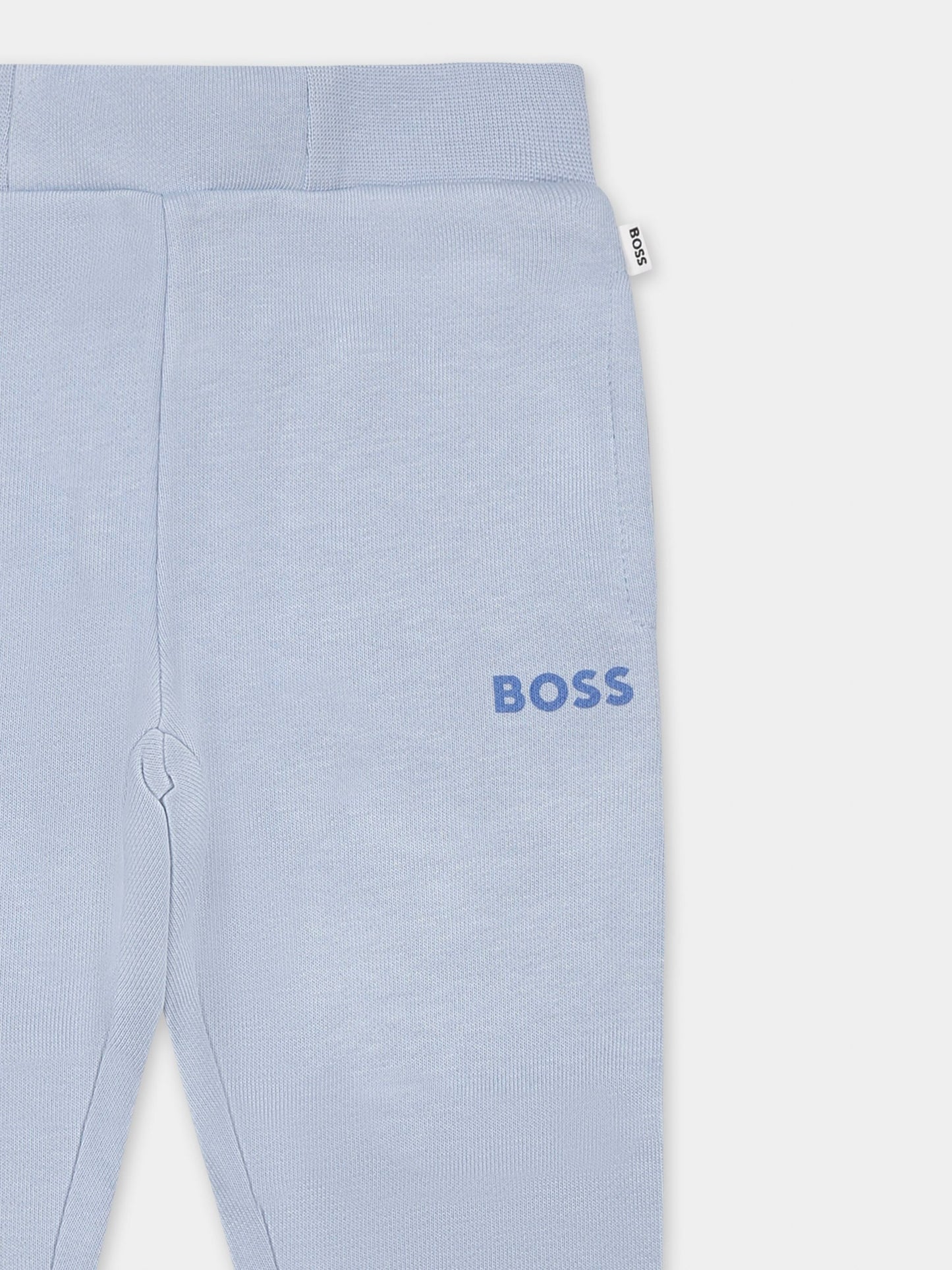 Light blue trousers for baby boy with logo
