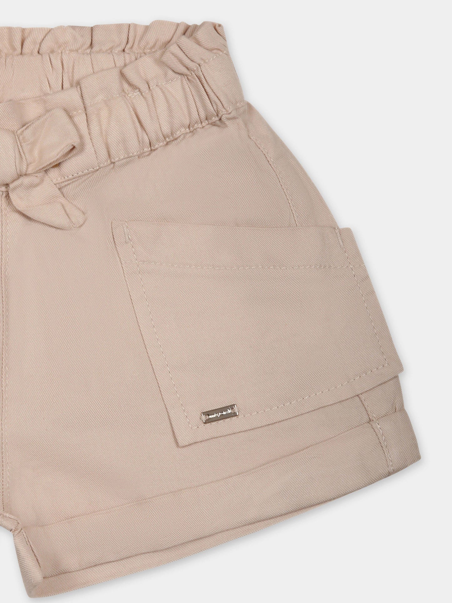 Beige shorts for baby girl with logo