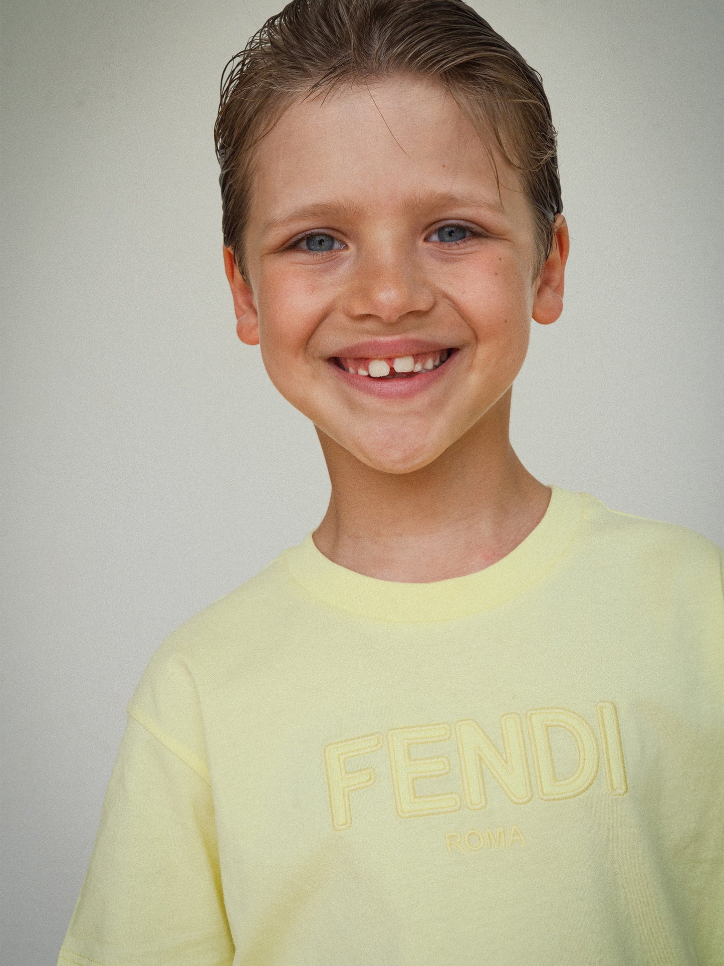 Yellow t-shirt for kids with logo