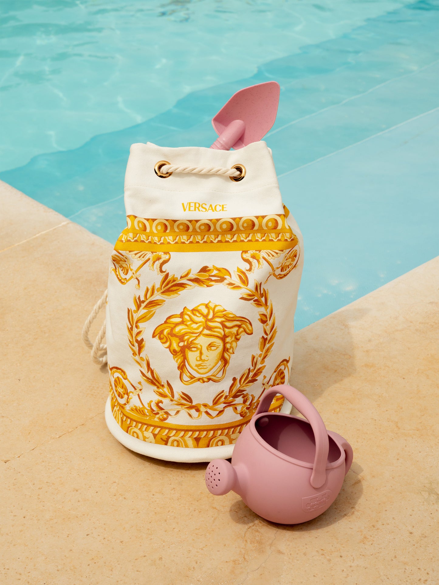 Pink watering can for kids