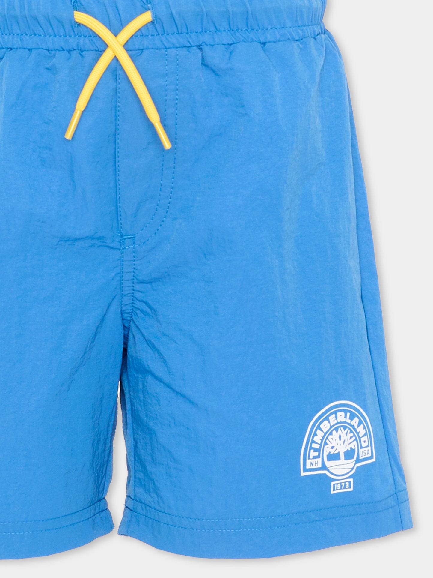 Blue swim trunks for Boy with logo